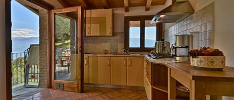 Fridge, coffee/tea maker, electric kettle, cookware/dishes/utensils