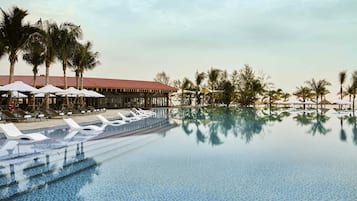 2 outdoor pools, open 7:00 AM to 7:00 PM, pool loungers