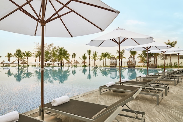 2 outdoor pools, open 7:00 AM to 8:00 PM, free cabanas, pool umbrellas