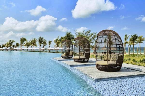 2 outdoor pools, open 7:00 AM to 7:00 PM, pool loungers