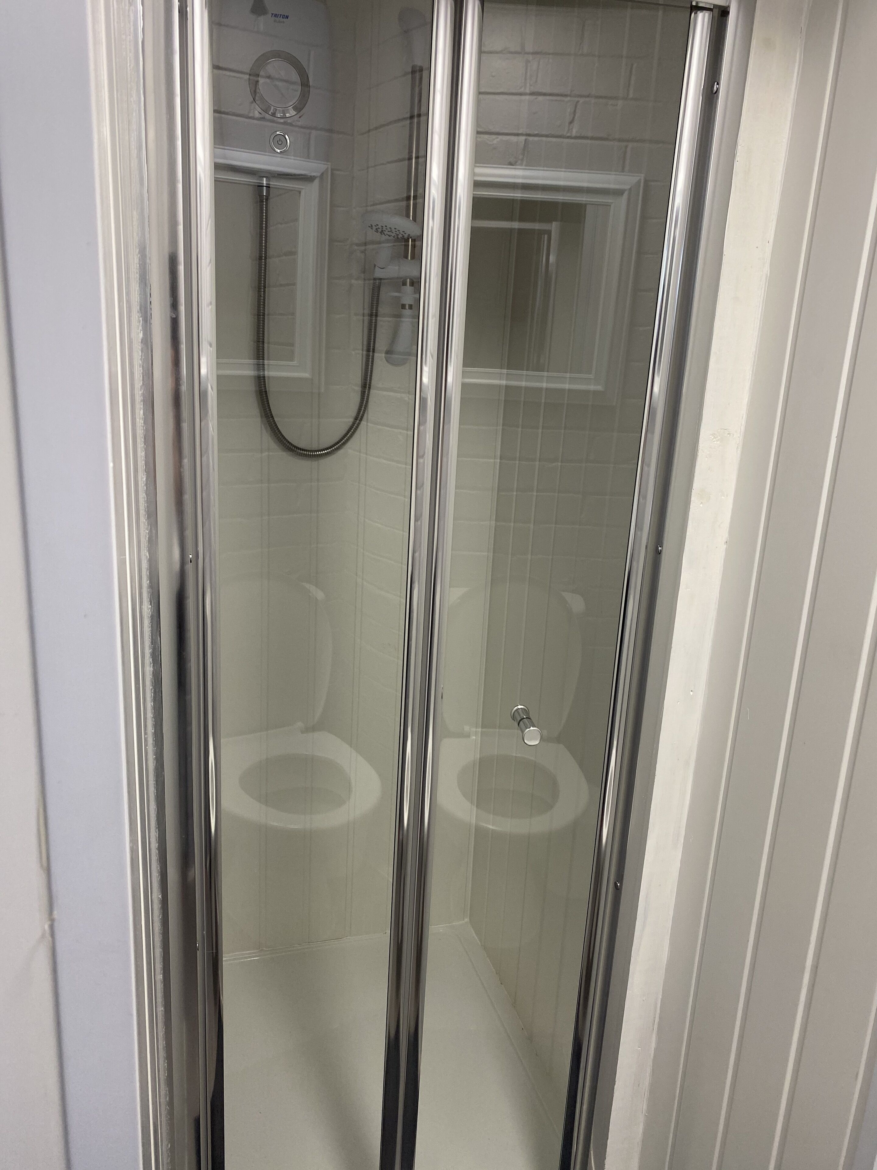 Separate tub and shower, hair dryer, towels, soap