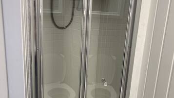 Separate tub and shower, hair dryer, towels, soap