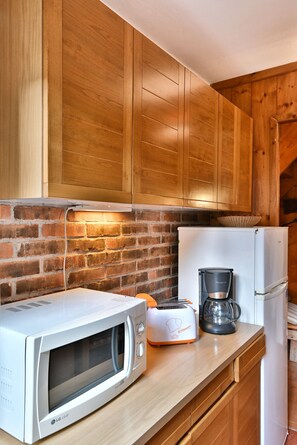 Fridge, microwave, coffee/tea maker, toaster