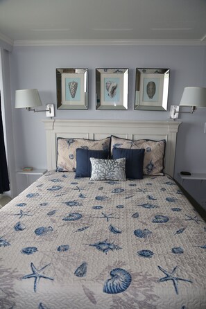 Tabla de planchar con plancha, wifi gratis y ropa de cama 