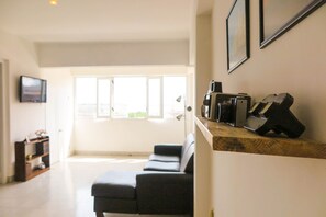 Appartement, 1 chambre | Salle de séjour