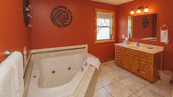 Shower, jetted tub, hair dryer, towels