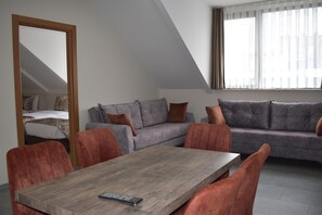 Deluxe Suite | Living room | LCD TV