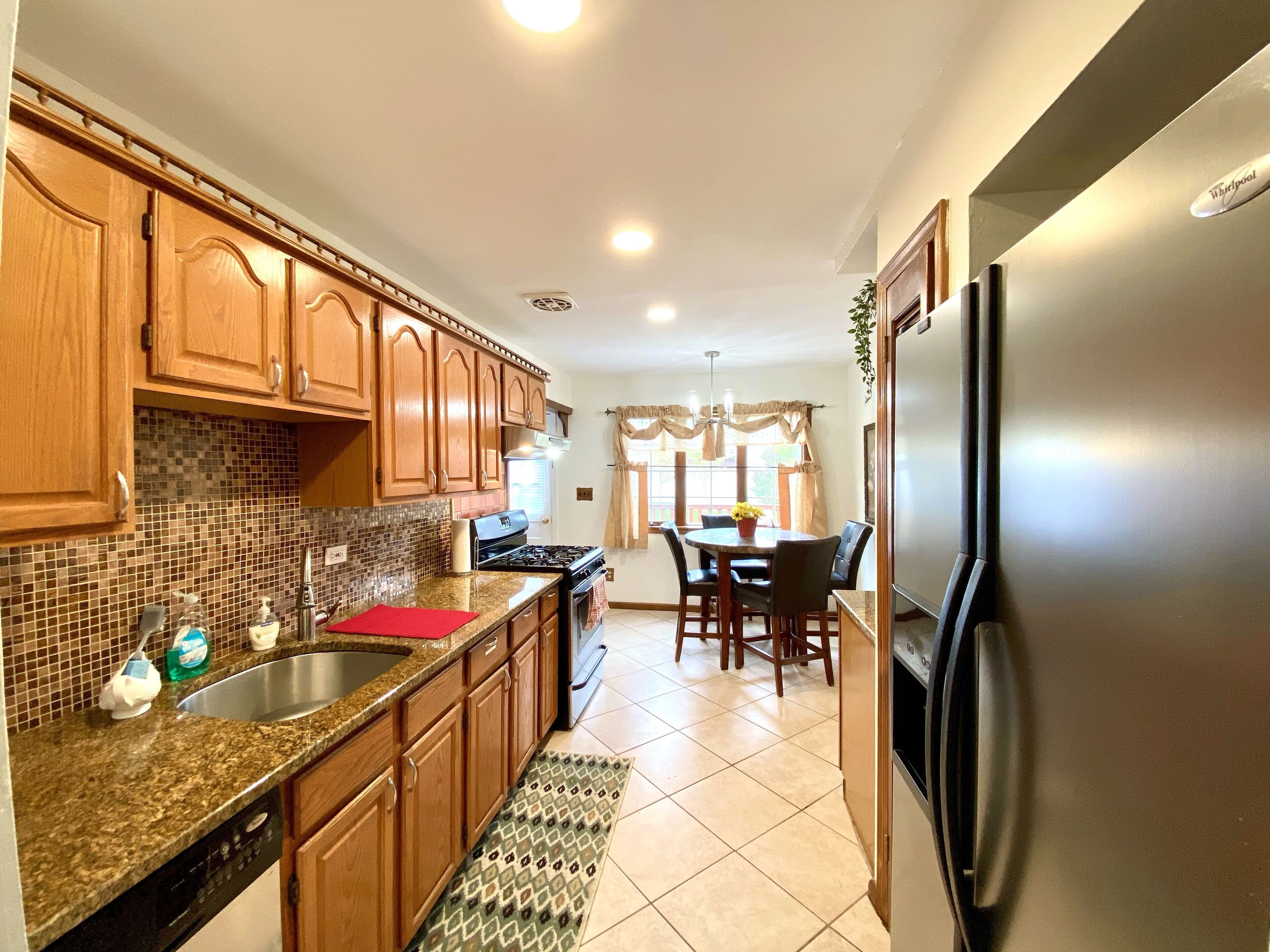 Eat in kitchen with bay window and direct access to oversized deck
