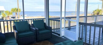 Familjhem vid stranden vid stranden