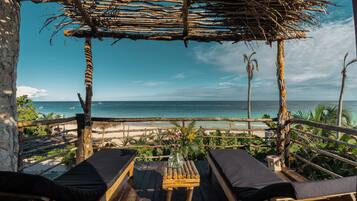 Cabaña, 1 cama King size, balcón, frente al mar | Terraza o patio