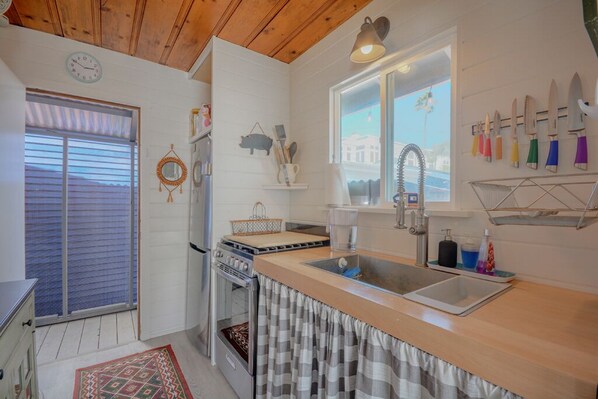 Fridge, microwave, oven, stovetop - Historic beachside home in charming Sunset Beach (Sunset Beach)