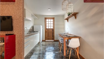 Full-size fridge, stovetop, coffee/tea maker, toaster