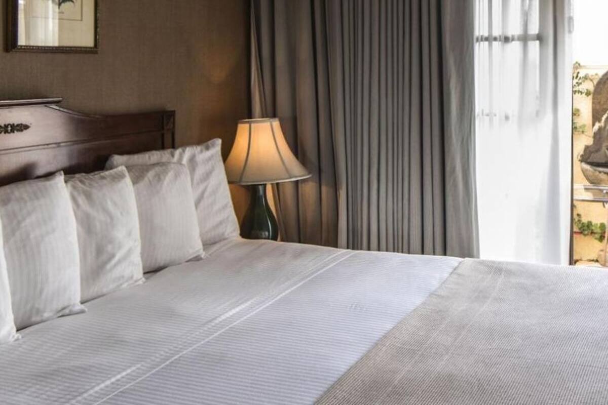 premium bedding, pillow-top beds, desk, blackout curtains