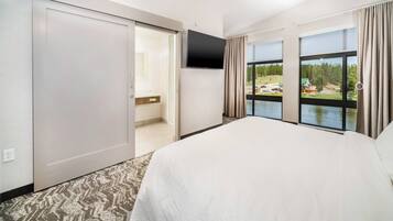 Blackout drapes, iron/ironing board, bed sheets