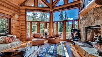 House, Multiple Beds (GoldenView Lodge) | Living room | Flat-screen TV, fireplace, DVD player