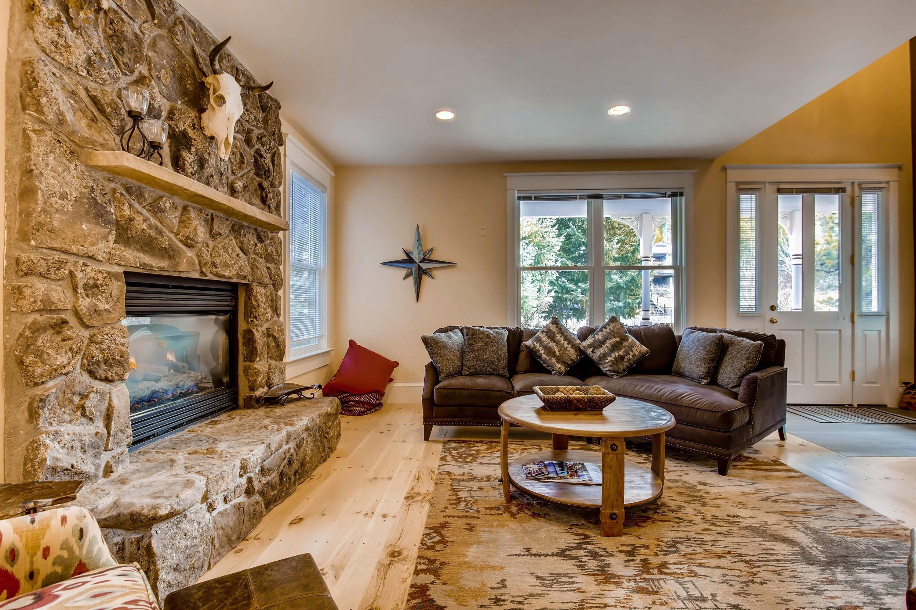 House, Multiple Beds (Hideaway on High) | Living room | TV, fireplace
