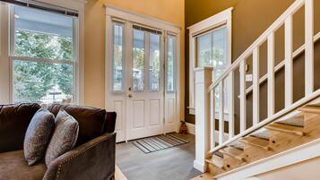 House, Multiple Beds (Hideaway on High) | Living room | TV, fireplace