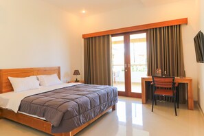 Kamar Double Deluks | Meja kerja, tirai kedap cahaya, Wi-Fi gratis, dan seprai linen