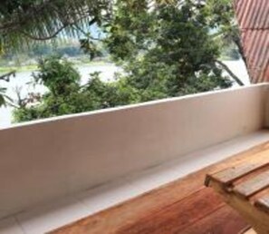 Family Room | Terrace/patio - Laster Jony's Guest House (Samosir)