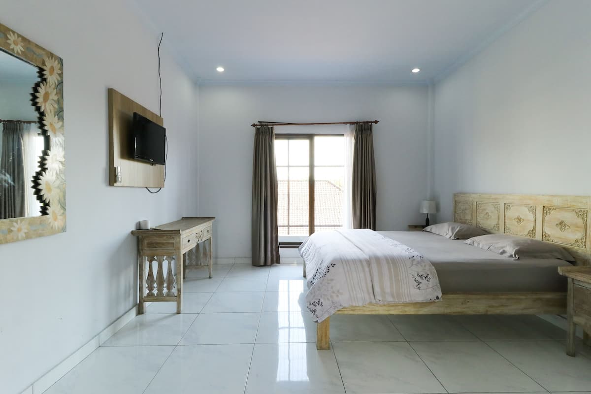 Kamar Deluks | Wi-Fi gratis dan seprai linen