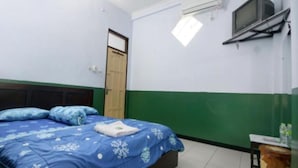 Standard Double with AC | Laptop workspace, bed sheets - Ardian Borobudur (Borobudur)