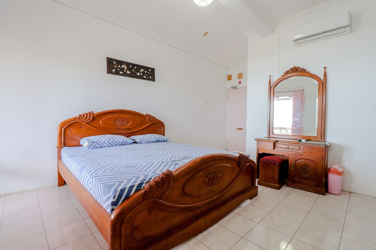 Deluxe kamer | Een bureau, gratis wifi, beddengoed