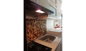 Studio Apartment | Private kitchen | Fridge - Anggun Properti Apartemen Bogor Valley (Bogor)
