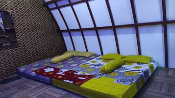 Family Room | Desk, bed sheets