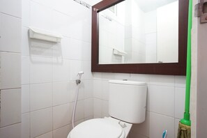 Studio | Bathroom | Shower, rainfall showerhead, free toiletries, towels - The Suites Metro Apartment by Lupie Dewi (Bandung)