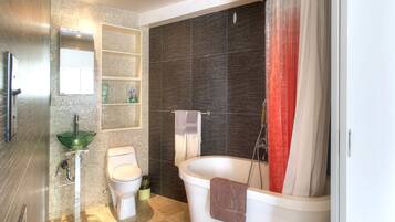 Studio | Bathroom | Combined shower/tub, deep soaking tub, hair dryer, towels