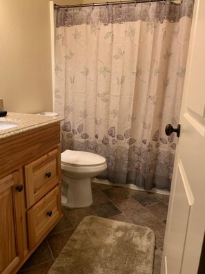Combined shower/tub, hair dryer, towels, soap - Anderson Island's most peaceful home (Anderson Island)
