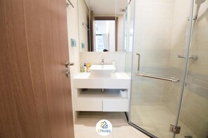 Standard Apartment | Bathroom | Separate tub and shower, rainfall showerhead, free toiletries - TCOO Luxury Apartment (Hanoi)
