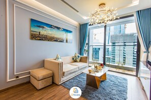 Family Apartment | Living room | 50-inch Smart TV with satellite channels, TV