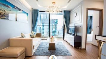 Family Apartment | Living room | 50-inch Smart TV with satellite channels, TV