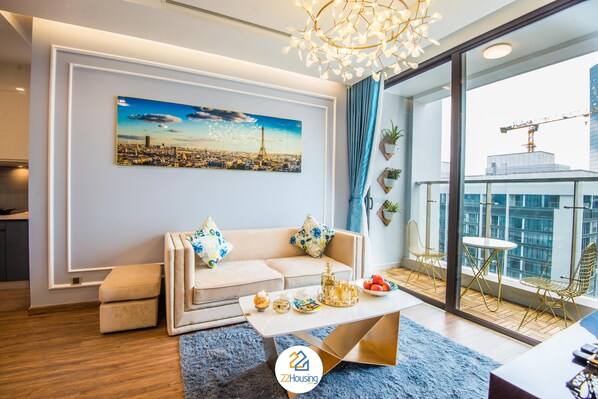 Family Apartment | Living area | 50-inch Smart TV with satellite channels, TV - TCOO Luxury Apartment (Hanoi)