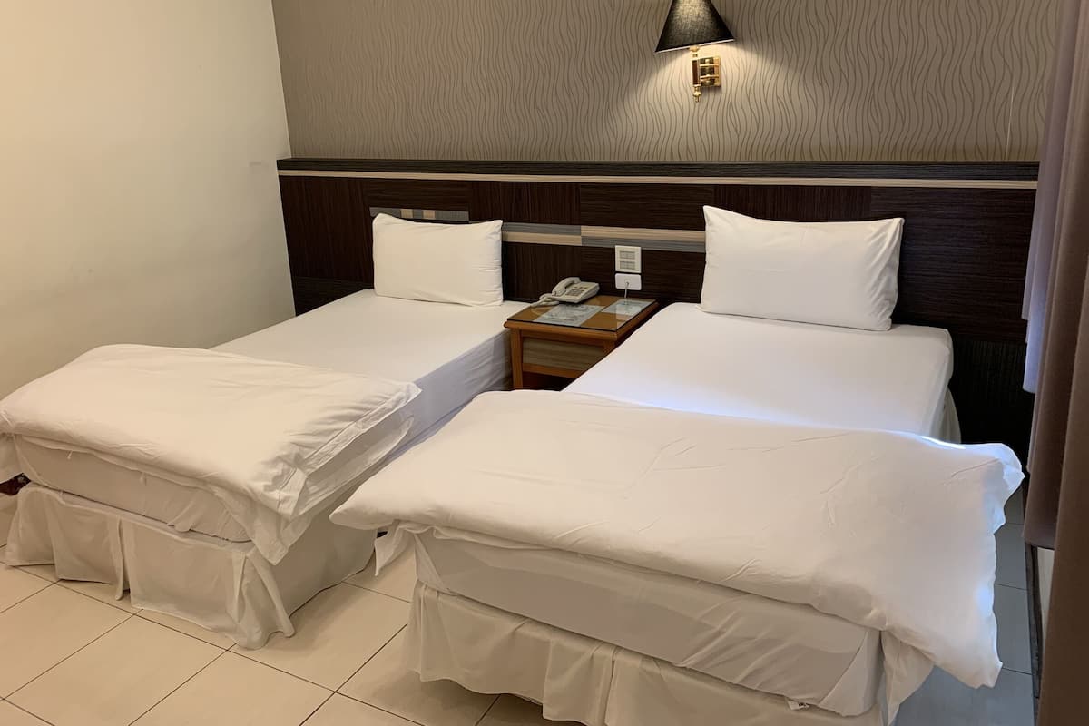 Twin kamer | Verduisterende gordijnen, gratis wifi, beddengoed