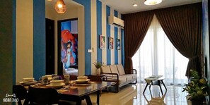Family Apartment, 2 Bedrooms (2 Bathrooms) | Living area | Flat-screen TV