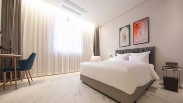 Royal Suite | Roupas de cama premium, cofres nos quartos, cortinas blackout