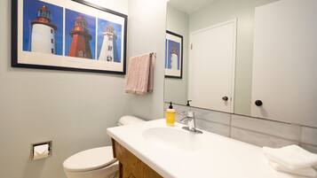 Combined shower/tub, hair dryer, towels, soap