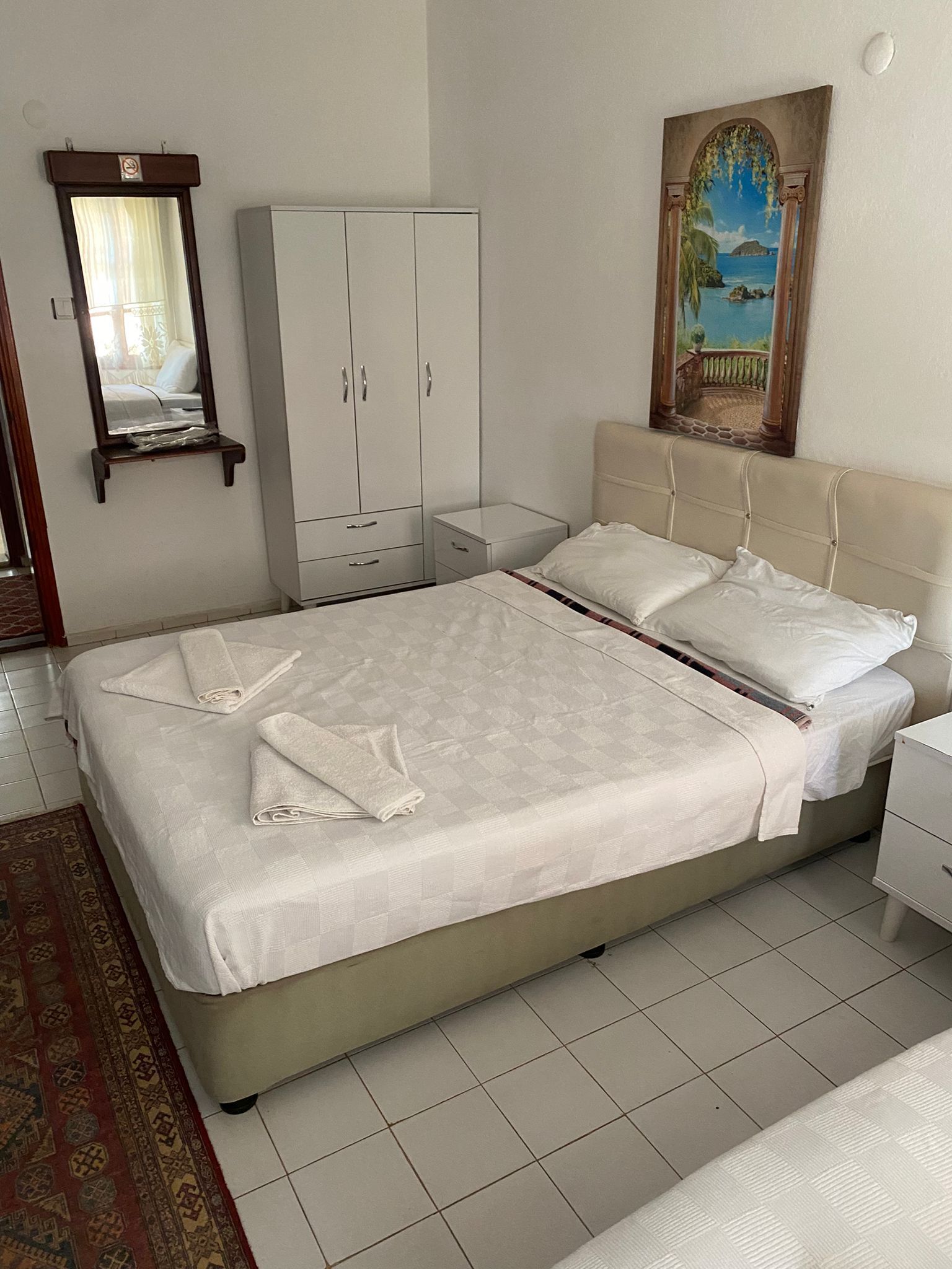 traditional double room, 1 queen bed, non smoking, partial sea view | laptop workspace, free wifi, bed sheets
