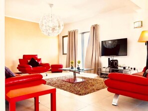 Deluxe-Penthouse | Wohnzimmer | Flachbildfernseher