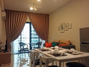 Family Suite, 2 Bedrooms | Living area | Flat-screen TV - Pool View Suites (Johor Bahru)