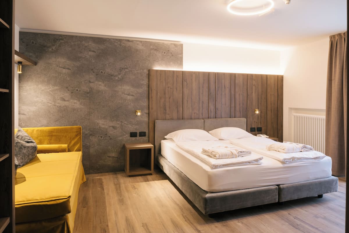 Design-Suite | 2 Schlafzimmer, Zimmersafe, individuell dekoriert