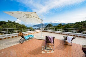 Exclusive Villa, 6 Bedrooms, Sea View | Terrace/patio