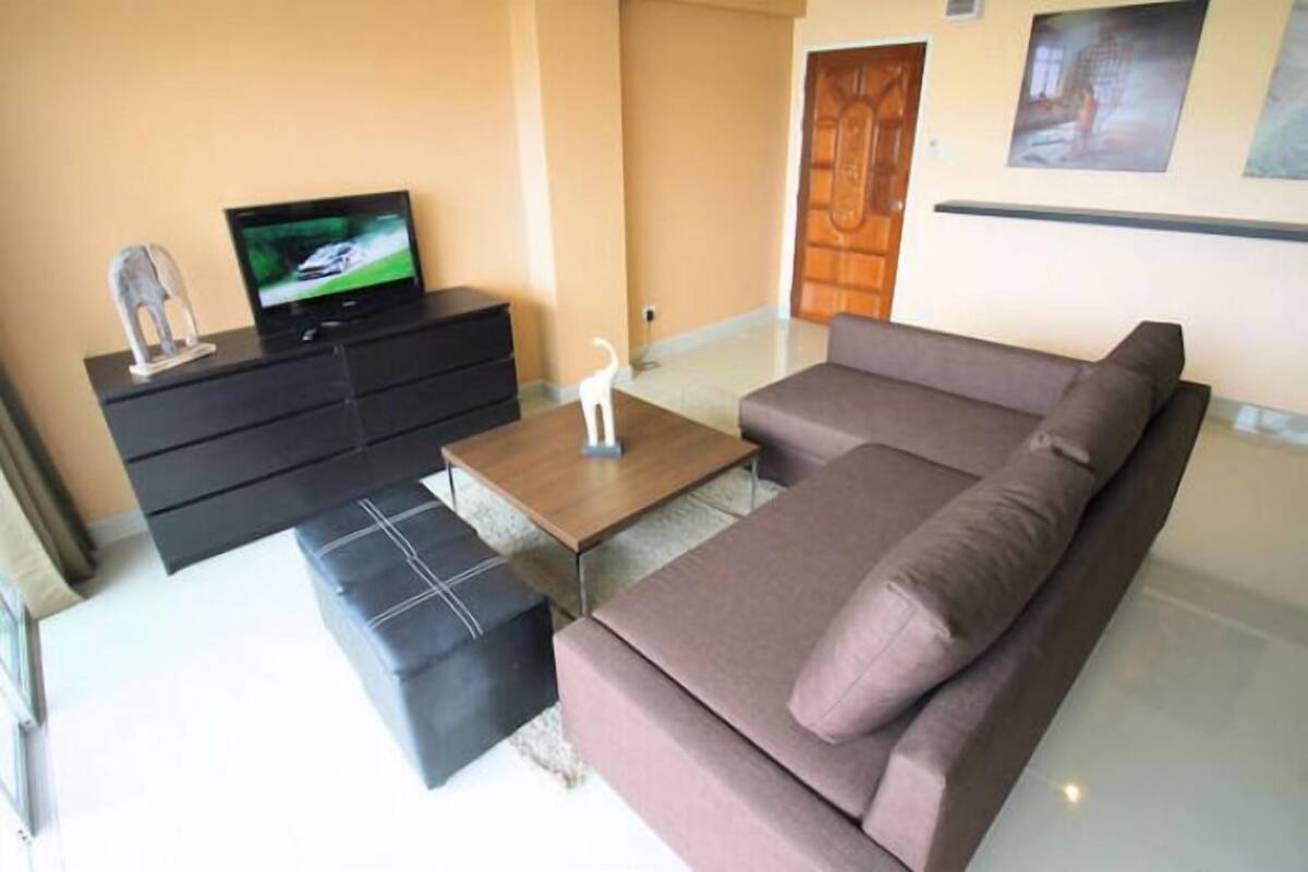 2-Bedroom Condo | Living room | Flat-screen TV