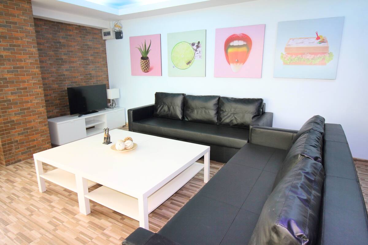 2-Bedroom Condo | Living room | Flat-screen TV