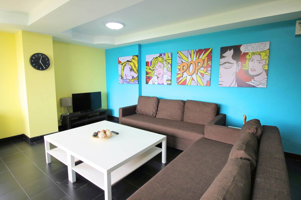 2-Bedroom Condo | Living room | Flat-screen TV