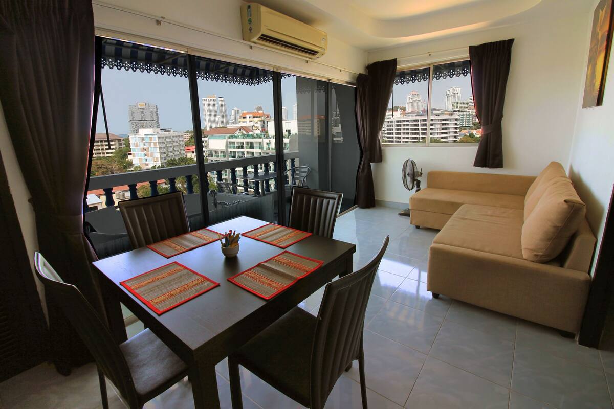 1-Bedroom Condo | Living area | Flat-screen TV