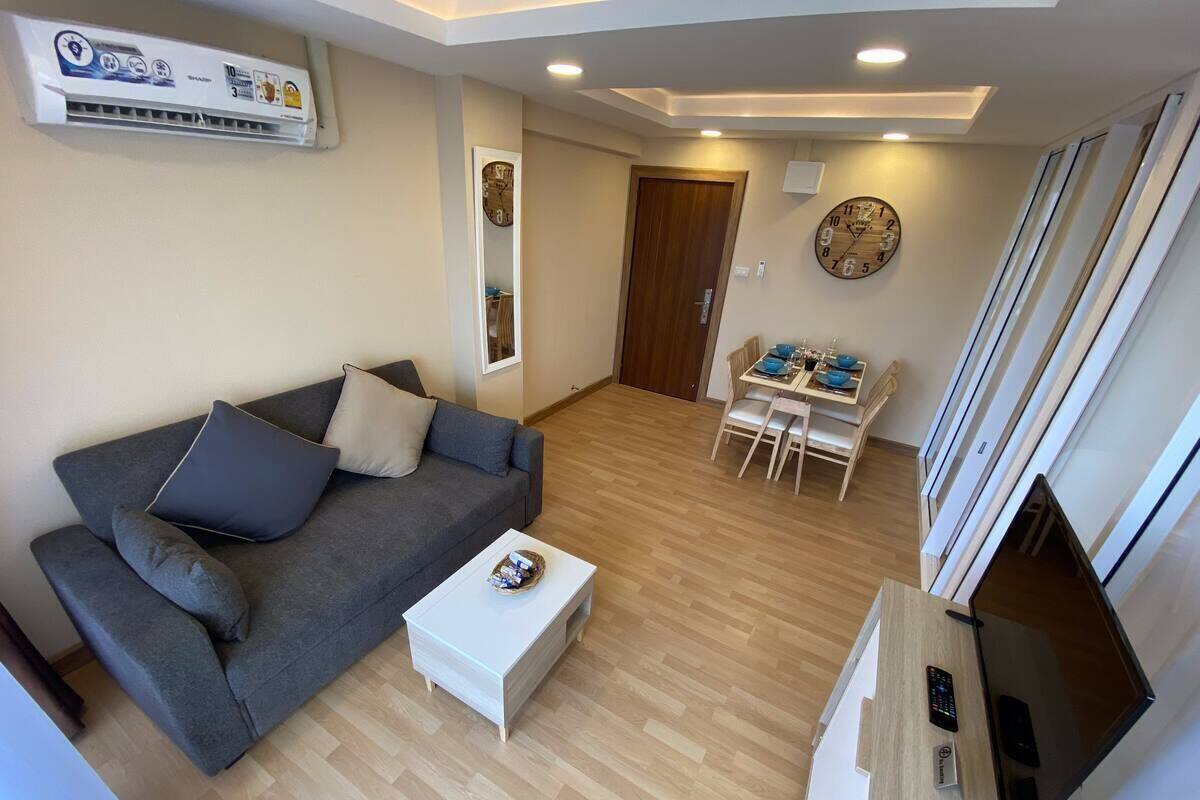 2-Bedroom Condo | Living room | Flat-screen TV
