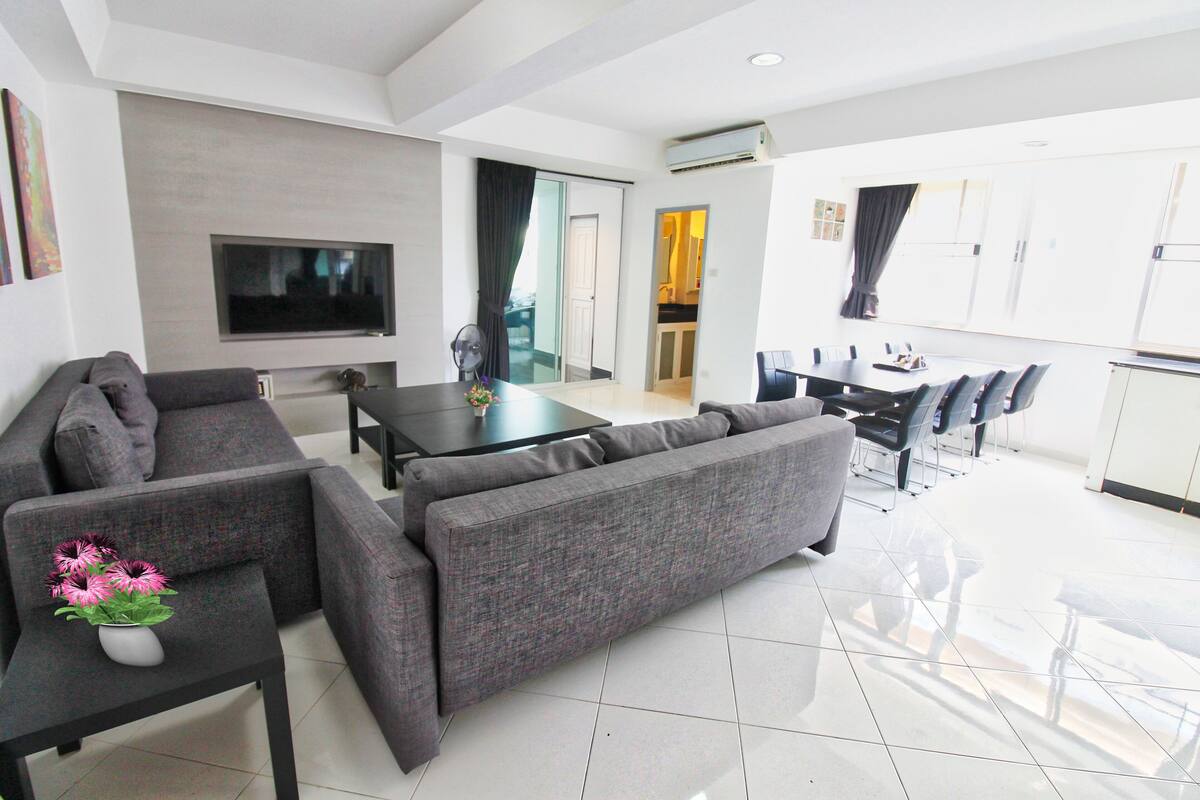2-Bedroom Condo | Living area | Flat-screen TV